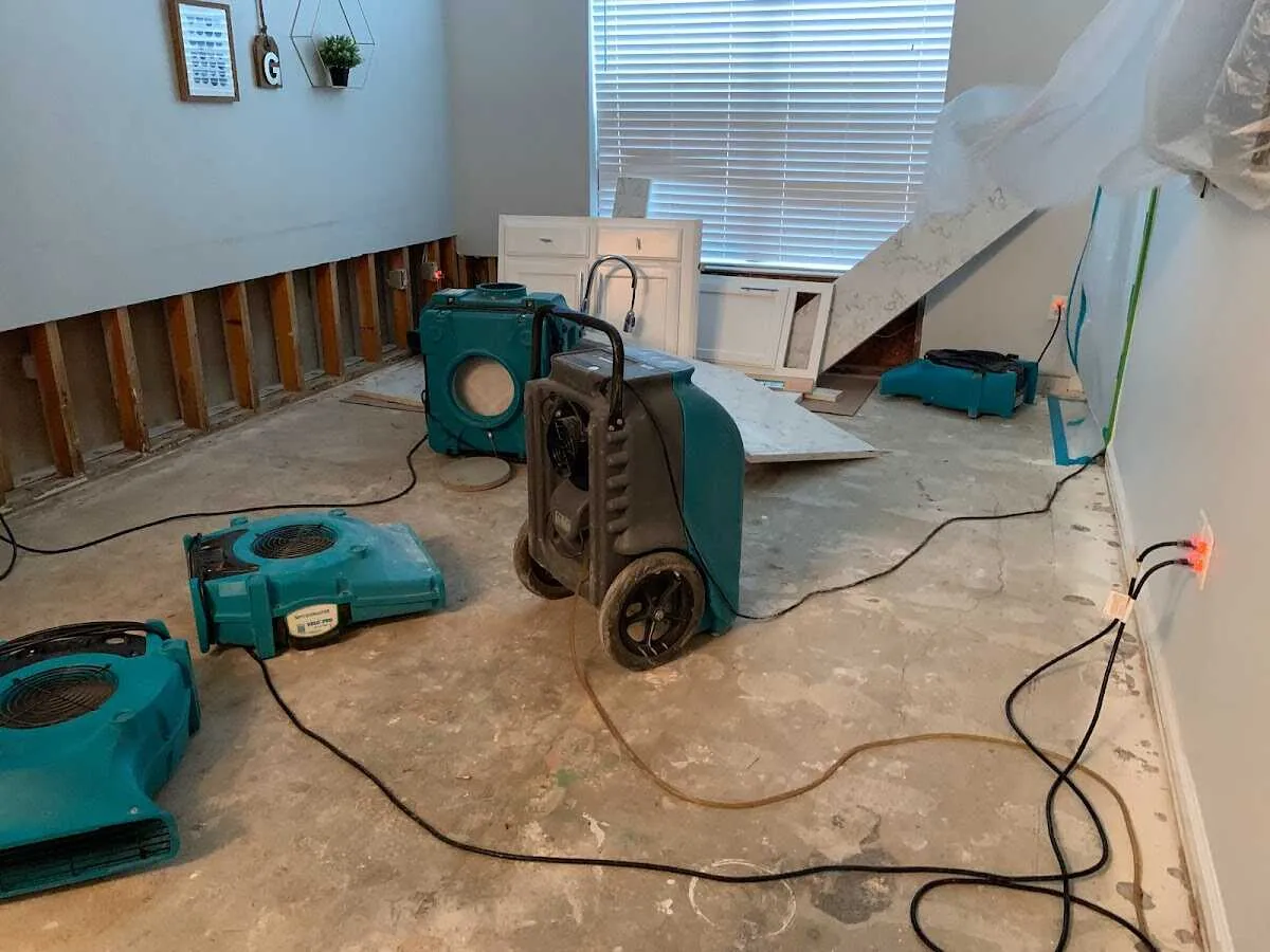 Dehumidifier in flood-cut room for Water Damage Restoration in Thomson