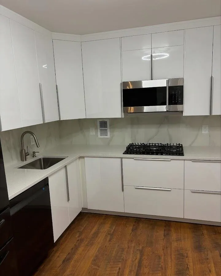 Restored kitchen with white cabinets after water damage in Thomson